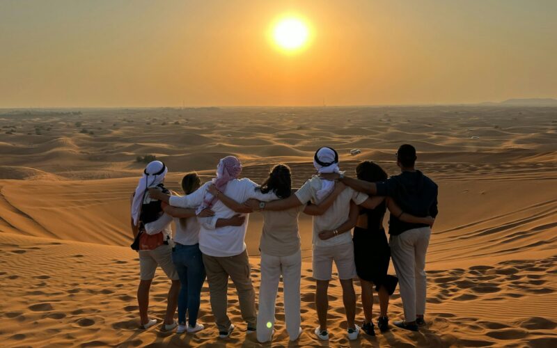 Dune bashing in a 4x4 during a sunset desert safari near Dubai
